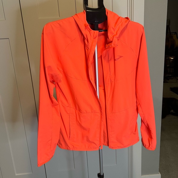 Brooks Jackets & Blazers - Brooks Women's Vibrant Orange lightweight jacket